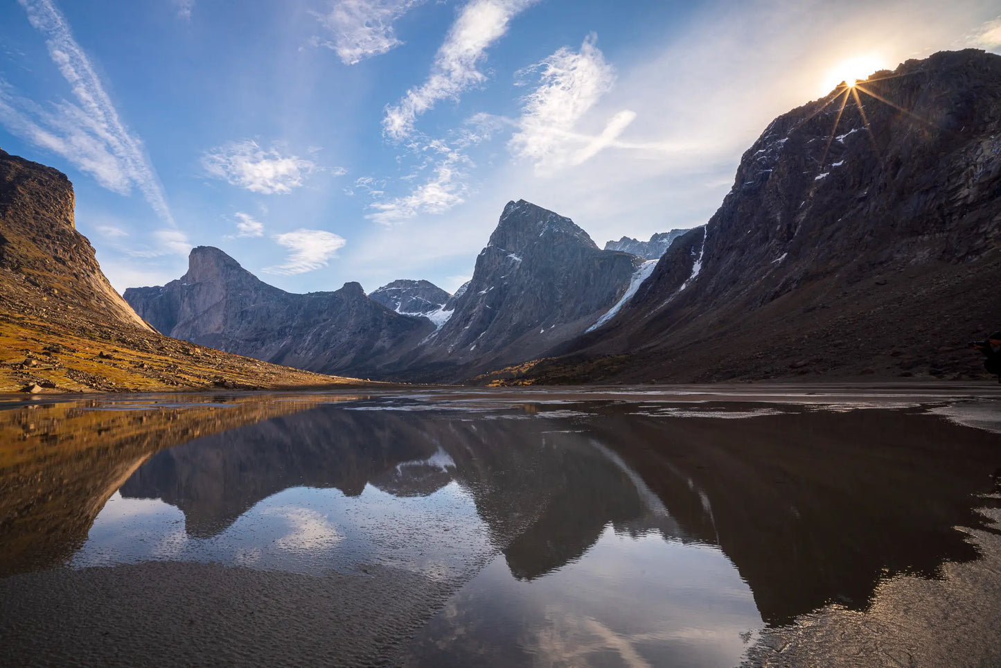 Reflections of Mount Thor from the valley floor